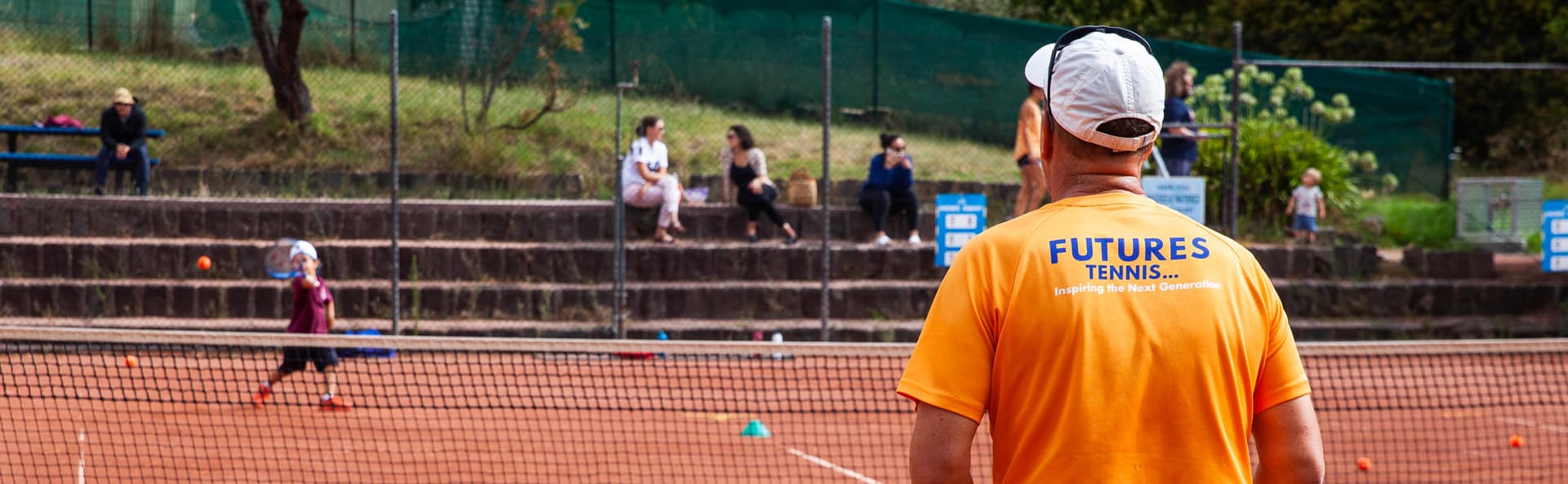 Coaches and players at Futures Tennis Academy